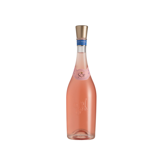 A bottle of Sof Rosato wine with a pink hue and a label that appears to be elegant and possibly organic, with a golden foil top.